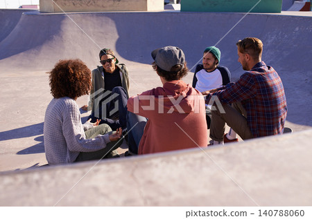Summer, skate park and friends with conversation, relax and discussion with weekend break and team. People, outdoor and skaters with social or recreation with diversity or support with group or gen z Summer, skate park and friends with conversation, relax and discussion with weekend break and team. People, outdoor and skaters with social or recreation with diversity or support with group or gen z 140788060