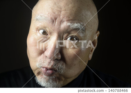 Close-up of an old man's face and expression Close-up of an old man's face and expression 140788466