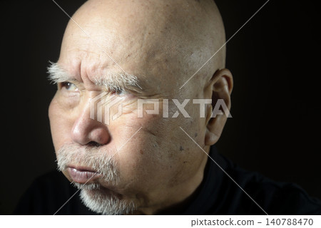 Close-up of an old man's face and expression Close-up of an old man's face and expression 140788470