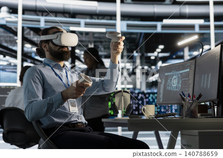 Software developer uses a VR headset to inspect AI neural networks and server systems in a high-tech facility. Software developer uses a VR headset to inspect AI neural networks and server systems in a high-tech facility. 140788659