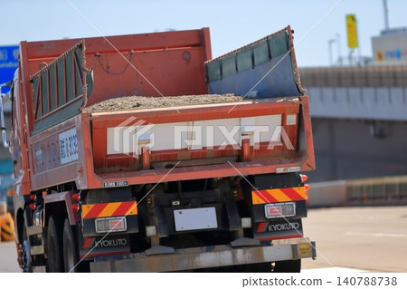 A dump truck in motion A dump truck in motion 140788738