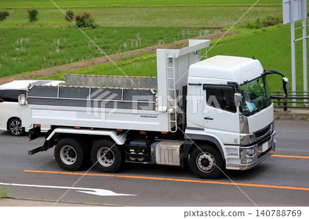 A dump truck in motion 140788769