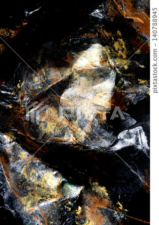 Shiny abstract metallic gold bronze and silver paint on a black background texture Shiny abstract metallic gold bronze and silver paint on a black background texture 140788945