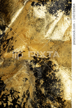 Gold metallic shiny paint strokes on black background Gold metallic shiny paint strokes on black background 140788964