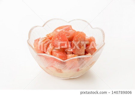 Tomato salad with sesame dressing 140789806