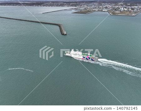 <Bird's-eye view> Ferry boat bound for Rebun Island departing from port <Bird's-eye view> Ferry boat bound for Rebun Island departing from port 140792145