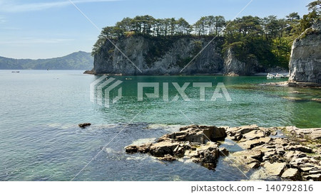 Jodogahama Beach (Miyako City, Iwate Prefecture) is adorned with a clear blue sky and emerald green waters under a beautiful May day. Jodogahama Beach (Miyako City, Iwate Prefecture) is adorned with a clear blue sky and emerald green waters under a beautiful May day. 140792816