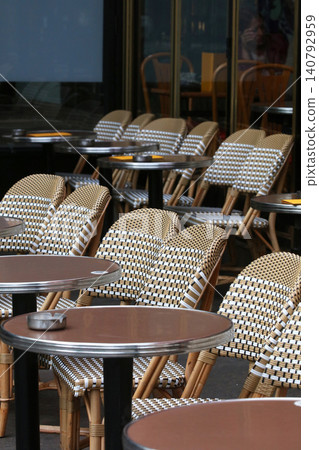 Chairs lined up in a cafe in Paris, France Chairs lined up in a cafe in Paris, France 140792959