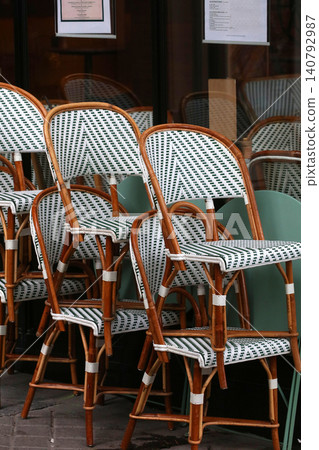 Chairs lined up in a cafe in Paris, France Chairs lined up in a cafe in Paris, France 140792987