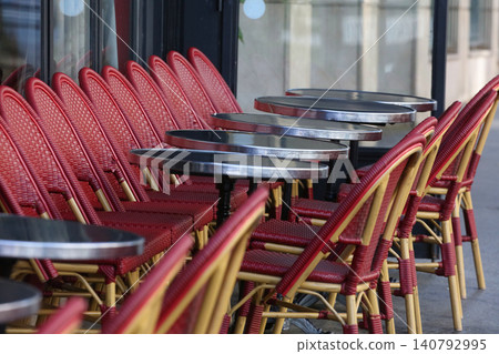 Chairs lined up in a cafe in Paris, France Chairs lined up in a cafe in Paris, France 140792995