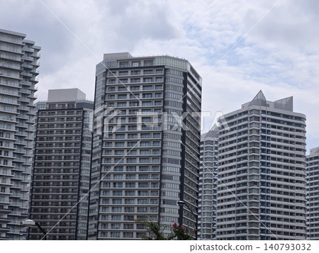 A cluster of modern high-rise condominiums stands in the Yokohama Minato Mirai district. A cluster of modern high-rise condominiums stands in the Yokohama Minato Mirai district. 140793032