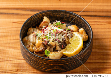 Grilled squid tentacles with a savory butter and soy sauce flavor that will whet your appetite. Grilled squid tentacles with a savory butter and soy sauce flavor that will whet your appetite. 140793285