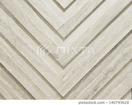 Beige Marble Stone Wall Tiles with Elegant V Shape Pattern, Modern Luxury Feature Wall Surface for Interior Architecture and Premium Decor. Beige Marble Stone Wall Tiles with Elegant V Shape Pattern, Modern Luxury Feature Wall Surface for Interior Architecture and Premium Decor. 140793628