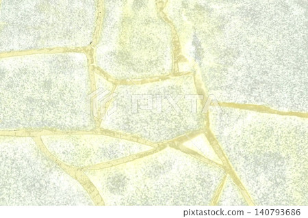 An abstract texture of irregular cobblestones colored in pale yellow-green and beige. An abstract texture of irregular cobblestones colored in pale yellow-green and beige. 140793686