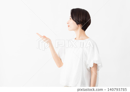 A woman wearing a white blouse - Lifestyle image A woman wearing a white blouse - Lifestyle image 140793785
