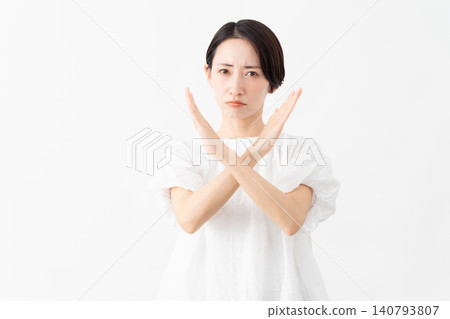A woman wearing a white blouse - Lifestyle image A woman wearing a white blouse - Lifestyle image 140793807