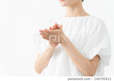A woman wearing a white blouse - Lifestyle image 140793812