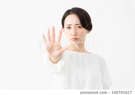 A woman wearing a white blouse - Lifestyle image A woman wearing a white blouse - Lifestyle image 140793827