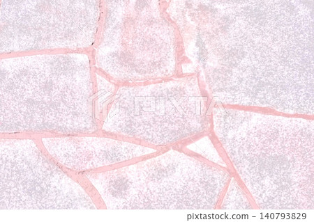 An abstract texture of irregularly shaped cobblestones colored in pale pink. An abstract texture of irregularly shaped cobblestones colored in pale pink. 140793829