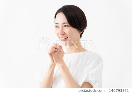 A woman wearing a white blouse - Lifestyle image A woman wearing a white blouse - Lifestyle image 140793851