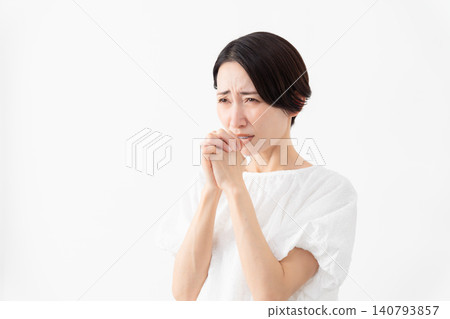 A woman wearing a white blouse - Lifestyle image A woman wearing a white blouse - Lifestyle image 140793857