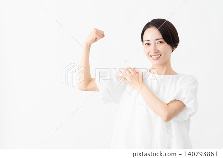 A woman wearing a white blouse - Lifestyle image A woman wearing a white blouse - Lifestyle image 140793861