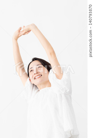A woman wearing a white blouse - Lifestyle image A woman wearing a white blouse - Lifestyle image 140793870