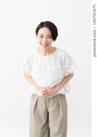 A woman wearing a white blouse - Lifestyle image A woman wearing a white blouse - Lifestyle image 140793875