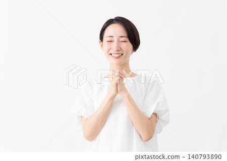 A woman wearing a white blouse - Lifestyle image A woman wearing a white blouse - Lifestyle image 140793890