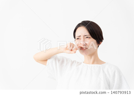 A woman wearing a white blouse - Lifestyle image A woman wearing a white blouse - Lifestyle image 140793913