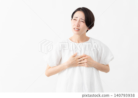 A woman wearing a white blouse - Lifestyle image A woman wearing a white blouse - Lifestyle image 140793938