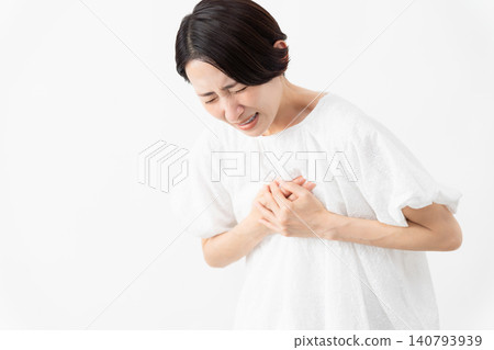 A woman wearing a white blouse - Lifestyle image A woman wearing a white blouse - Lifestyle image 140793939