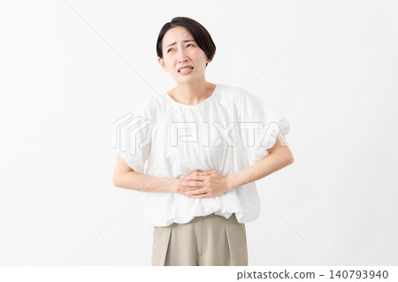 A woman wearing a white blouse - Lifestyle image A woman wearing a white blouse - Lifestyle image 140793940