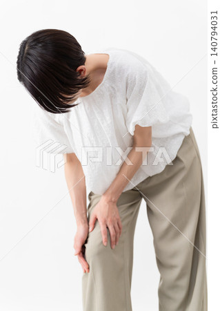 A woman wearing a white blouse - Lifestyle image A woman wearing a white blouse - Lifestyle image 140794031