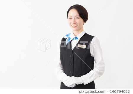 A female attendant in uniform; travel image A female attendant in uniform; travel image 140794032