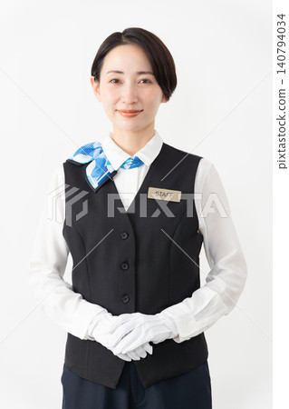 A female attendant in uniform; travel image A female attendant in uniform; travel image 140794034