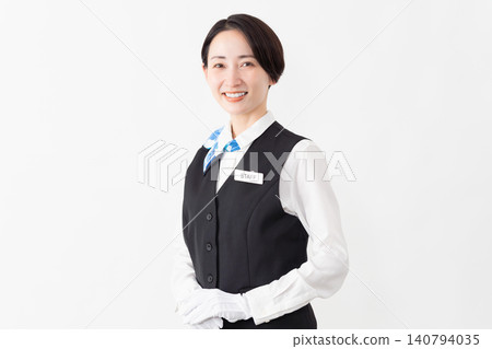 A female attendant in uniform; travel image A female attendant in uniform; travel image 140794035