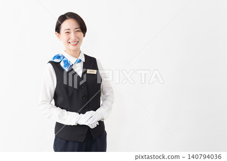 A female attendant in uniform; travel image A female attendant in uniform; travel image 140794036
