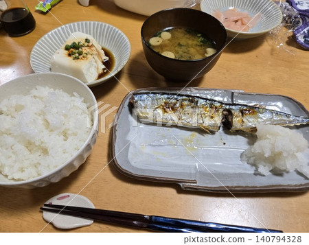 A healthy Japanese dinner of grilled fish and tofu A healthy Japanese dinner of grilled fish and tofu 140794328