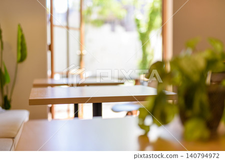 Cafe table and the view outside the window Cafe table and the view outside the window 140794972