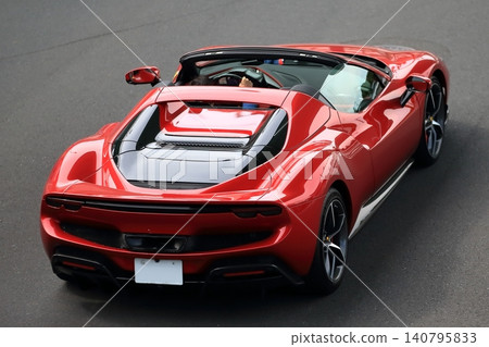 Italian-made red sports car Italian-made red sports car 140795833
