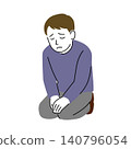 A man reflecting on his actions while sitting in a simple, formal kneeling position. 140796054