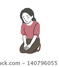 A woman sitting in a simple, formal kneeling position, showing remorse. 140796055