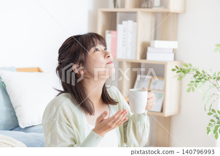 Young women taking medicine or vitamins Young women taking medicine or vitamins 140796993