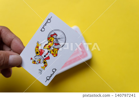 person with playing cards person with playing cards 140797241