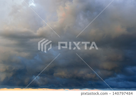 Dark Overcast Sky Filled with Heavy Grey Storm Clouds Before Rain Outdoors Dark Overcast Sky Filled with Heavy Grey Storm Clouds Before Rain Outdoors 140797484