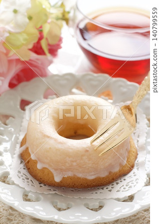 Lemon icing donut and lemon tea Lemon icing donut and lemon tea 140799559