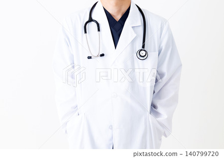 Middle-aged male doctor wearing a white coat Middle-aged male doctor wearing a white coat 140799720