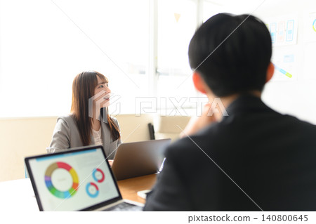 Business woman having a meeting Business woman having a meeting 140800645