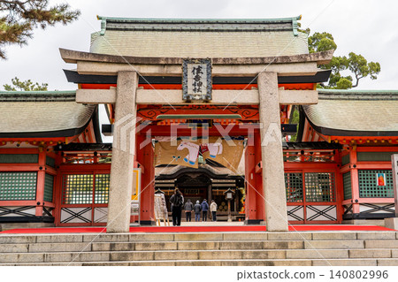 Sumiyoshi Taisha Shrine, Sumiyoshi Ward, Osaka City: Corner Torii Gate and Kojumon Gate; God of Navigation and Port. Sumiyoshi Taisha Shrine, Sumiyoshi Ward, Osaka City: Corner Torii Gate and Kojumon Gate; God of Navigation and Port. 140802996